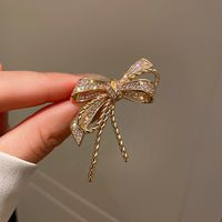 Moda Oval Flor Mariposa Cobre Embutido Diamantes De Imitación Perla Mujeres Broches sku image 102