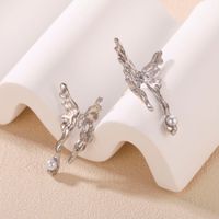 1 Pair Fashion Butterfly Alloy Inlay Pearl Women's Ear Studs main image 1