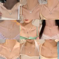 1 Piece Sweet Heart Shape Butterfly Bow Knot Alloy Beaded Plating Inlay Rhinestones Women's Pendant Necklace main image 1