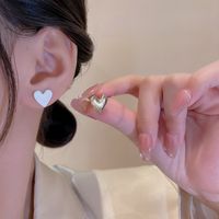 Fashion Heart Shape Alloy Asymmetrical Spray Paint Plating Women's Ear Studs 1 Pair main image 3