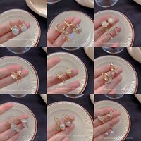 1 Pair Sweet Heart Shape Flower Bow Knot Artificial Pearl Alloy Rhinestone Inlay Artificial Gemstones Women's Earrings main image 1