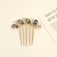 Women's Simple Style Shiny Round Butterfly Alloy Plating Inlay Rhinestones Pearl Insert Comb sku image 10