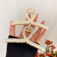 Femmes Luxueux Géométrique Alliage Incruster Perles Artificielles Strass Griffes De Cheveux main image 4