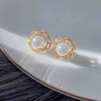 Moda Forma De Corazón Nudo De Lazo Aleación Embutido Perlas Artificiales Diamantes De Imitación Mujeres Pendientes 1 Par sku image 19