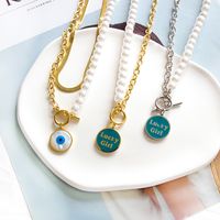 Retro Round Letter Devil's Eye Stainless Steel Inlay Artificial Pearls Necklace main image 1