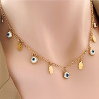 Mode Paume Forme De Cœur Œil Acier Au Titane Placage Collier 1 Pièce main image 1