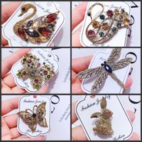 Simple Style Rabbit Swan Butterfly Alloy Plating Hollow Out Inlay Rhinestones Women's Brooches main image 1