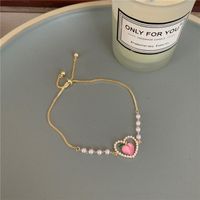 Fashion Heart Shape Alloy Titanium Steel Plating Rhinestones Artificial Pearls Women'S Bracelets main image 3