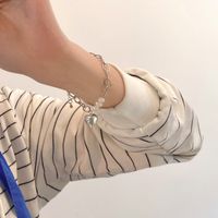 Fashion Heart Shape Alloy Titanium Steel Plating Rhinestones Artificial Pearls Women'S Bracelets main image 2