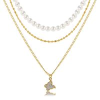 Retro Full Rhinestone Butterfly Pearl Three-layer Gold Alloy Necklace Wholesale main image 1