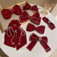 New Year's Retro Red Hairpin Christmas Headdress Diamond Pearl Fabric Bow Spring Clip main image 1