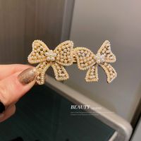 Fashion Korean Electroplating Pearl Bow Hairpin Personality Simple Alloy Hair Clip main image 4