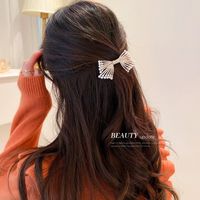 Fashion Korean Electroplating Pearl Bow Hairpin Personality Simple Alloy Hair Clip main image 5