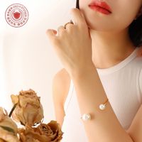 Korean Style Imitation Pearl Opening Bracelet Titanium Steel Plated 18k Gold Jewelry Wholesale main image 4