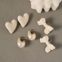 Europe And America Acrylic Chain Heart Bow Retro Ear Stud Resin Earrings Wholesale main image 4