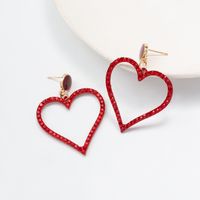 Vintage Inlaid Rhinestone Hollow Red Heart Shaped Metal Earrings sku image 1