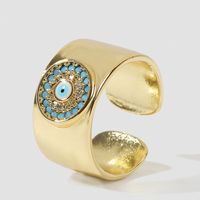 Fashion Creative Copper Inlaid Zircon Eye Color Retention Open Electroplating Ring main image 1