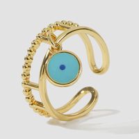 Fashion Simple Exquisite Dripping Oil Eyes Real Gold Electroplating Color Retention Adjustable Copper Ring main image 2