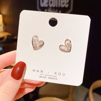 Fashion Small Heart Asymmetrical Inlaid Rhinestone Alloy Earrings Wholesale main image 1