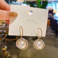 Korean Style Fashion Full Diamond Circle Copper Inlaid Pearl Earrings Wholesale main image 1
