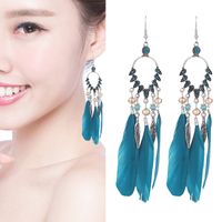 New Peacock Feather Diamond-studded Rice Bead Long Tassel Earrings main image 1