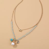 Simple Fashion Alloy Natural Rice Bead Pendant Double-layer Clavicle Chain Stacking Necklace main image 4