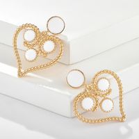 Pendientes Huecos Del Corazón Del Melocotón De La Moda Nuevos Pendientes Retros Del Corazón Del Giro Del Aceite Del Goteo sku image 5