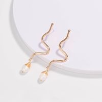Fashion Simple Inlaid Pearl Metal Curve Drop Earrings Wholesale main image 1