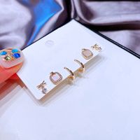 Fashion Inlaid Zircon Geometric Bow Copper Ear Stud Three Pairs Wholesale main image 3