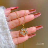 Fashion Titanium Steel Round Five-petal Flower Micro-encrusted Diamond Necklace main image 3