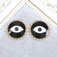 Vintage Contrast Color Alloy Oil Dripping Devil's Eye Earrings Wholesale main image 1