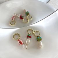 Retro Special-shaped Pearl Color Butterfly Shaped Earrings Wholesale main image 4