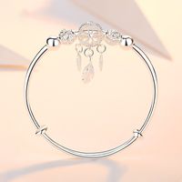 Fashion Bell Hollow Bracelet Dream Catcher Feather Push-pull Adjustable Copper Bracelet main image 4