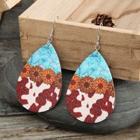 Fashion Turquoise Cow Grain Sunflower Pattern Leather Earrings main image 3