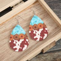 Fashion Turquoise Cow Grain Sunflower Pattern Leather Earrings main image 4