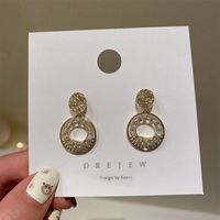 Boucles D&#39;oreilles Tendance En Métal À La Mode Avec Double Cercle Géométrique Creux Incrusté De Zircon main image 5