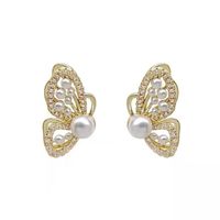Fashion Hollow Three-dimensional Butterfly Pearl Earrings Wholesale main image 4