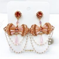 Vintage Exaggerated Bow Shaped Crystal Pearl Tassel Chain Earrings main image 1