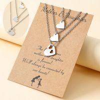 New Stainless Steel Hollow Heart-shaped Mother's Day Parent-child Card Necklace 3-piece Set main image 1
