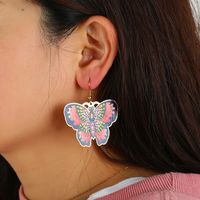 Printed New Fashion Exaggerated Butterfly Dripping Oil Flower Copper Earrings main image 1