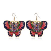 Printed New Fashion Exaggerated Butterfly Dripping Oil Flower Copper Earrings main image 6