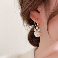 Fashion Pearl Diamond Bow Earrings Simple Alloy Earrings main image 1