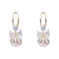 Fashion Pearl Diamond Bow Earrings Simple Alloy Earrings main image 6