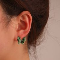 Retro Dark Green Butterfly Female Fashion Creative Metal Drip Oil Checkerboard Alloy Earrings main image 1