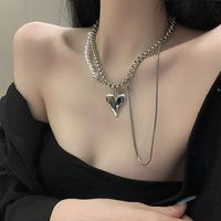 Vintage Stacked Irregular Heart Pearl Titanium Steel Necklace Wholesale main image 1