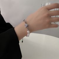 Fashion Pink Pearl Heart Double-layer Titanium Steel Clavicle Chain Bracelet Wholesale main image 4