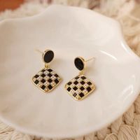 Fashion Black And White Checkerboard Square Pearl Alloy Earrings main image 4