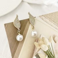 Fashion Pearl Diamond Earrings Simple Wing-shaped Alloy Earrings main image 1