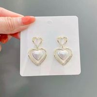 Fashion Three-dimensional Double-layer Heart-shaped Pearl Alloy Earrings main image 3