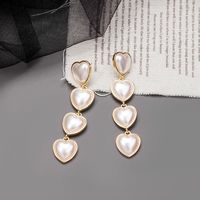 Fashion Long Heart Shaped Full Pearl Alloy Drop Earrings Wholesale main image 1